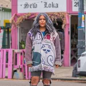 Claudia Biezunski-Rodriguez in front of the Sew Loka storefront